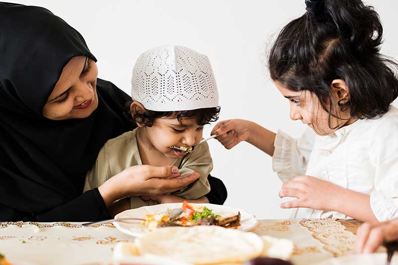 muslim-family-having-a-meal-2023-11-27-04-59-58-utc